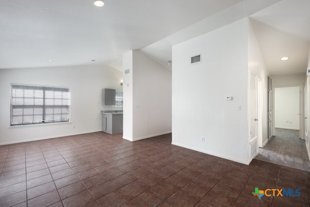 1102/1104/1106 Academy St, San Marcos, TX 78666 - unfurnished living room with recessed lighting, baseboards, and lofted ceiling