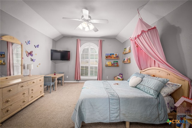 bedroom featuring lofted ceiling, carpet floors, and ceiling fan