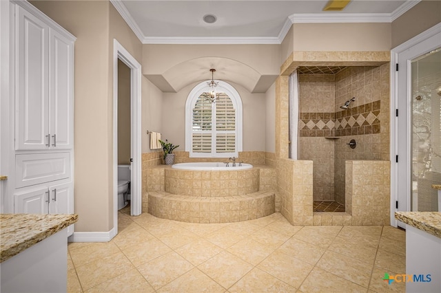 full bathroom with crown molding, vanity, tile patterned floors, shower with separate bathtub, and toilet