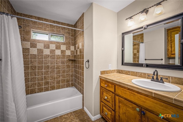 bathroom with vanity, shower / tub combo, and tile patterned floors