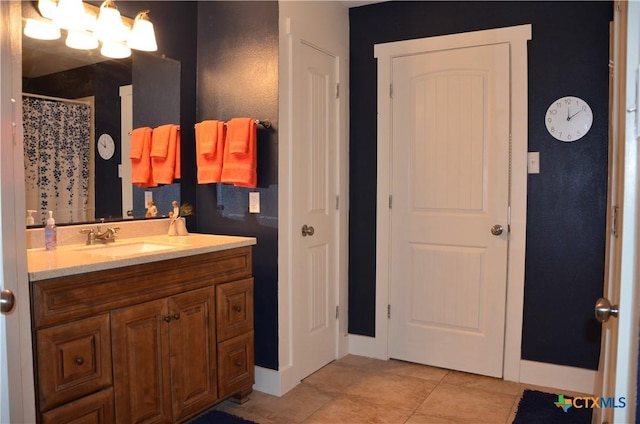 210 Meadow Ln, Martindale, TX 78655 - bathroom with vanity, tile patterned floors, and a chandelier