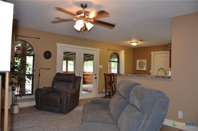 210 Meadow Ln, Martindale, TX 78655 - living area featuring french doors and a ceiling fan