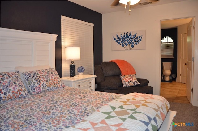 210 Meadow Ln, Martindale, TX 78655 - bedroom with tile patterned flooring and a ceiling fan