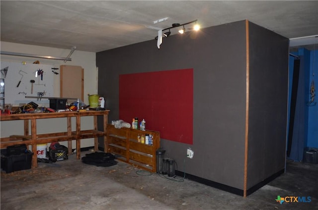 210 Meadow Ln, Martindale, TX 78655 - garage featuring a workshop area