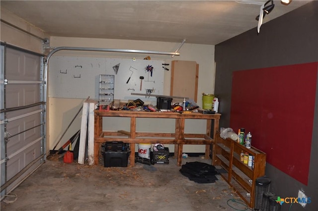 210 Meadow Ln, Martindale, TX 78655 - garage featuring a workshop area