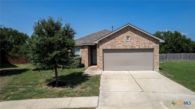 480 Waterloo Dr, Kyle, TX 78640 - ranch-style house featuring brick siding, an attached garage, and driveway