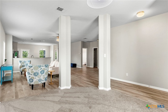 480 Waterloo Dr, Kyle, TX 78640 - living room featuring ceiling fan, baseboards, and wood finished floors