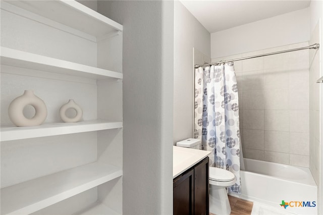 480 Waterloo Dr, Kyle, TX 78640 - full bathroom with shower / bathtub combination with curtain, vanity, toilet, and wood finished floors