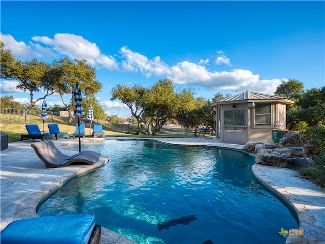 view of pool with a patio