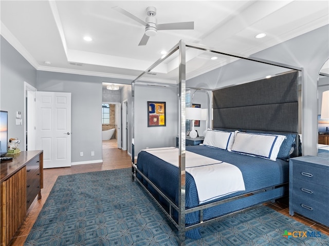 bedroom featuring ensuite bath, ceiling fan, and crown molding