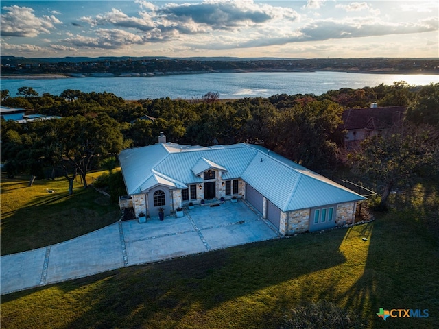 drone / aerial view featuring a water view