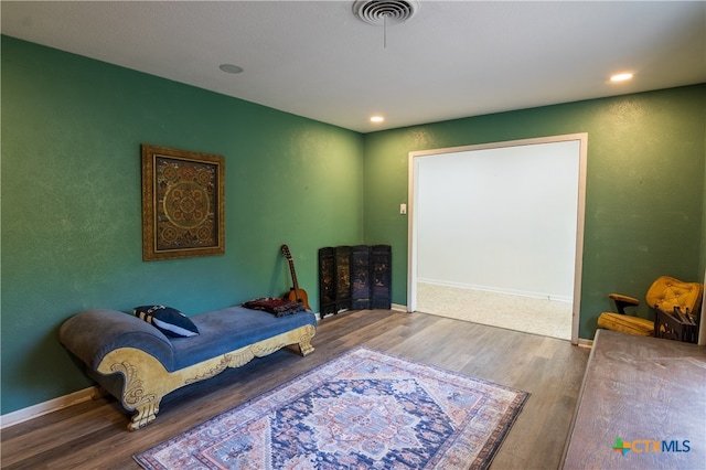 bedroom featuring hardwood / wood-style flooring