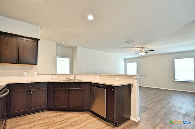 475 Autumn Leaf Dr, New Braunfels, TX 78130 - kitchen with dishwasher, dark brown cabinetry, a ceiling fan, light wood-type flooring, and recessed lighting
