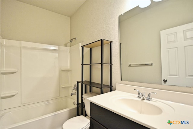 475 Autumn Leaf Dr, New Braunfels, TX 78130 - bathroom featuring a textured wall, vanity, and shower / washtub combination