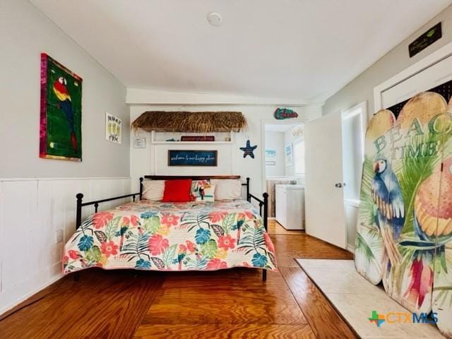 bedroom with wood-type flooring