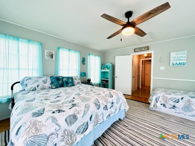 bedroom featuring ceiling fan