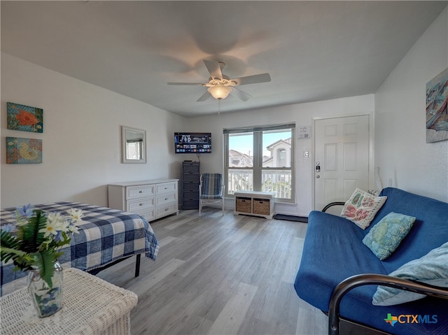 bedroom featuring light hardwood / wood-style floors and ceiling fan