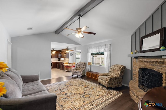 118 Byron Ln, Victoria, TX 77901 - living room featuring ceiling fan, wood finished floors, and a brick fireplace