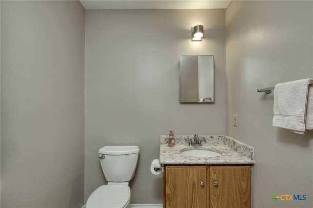 1335 Lakeside Loop, Round Rock, TX 78665 - half bathroom with vanity and toilet
