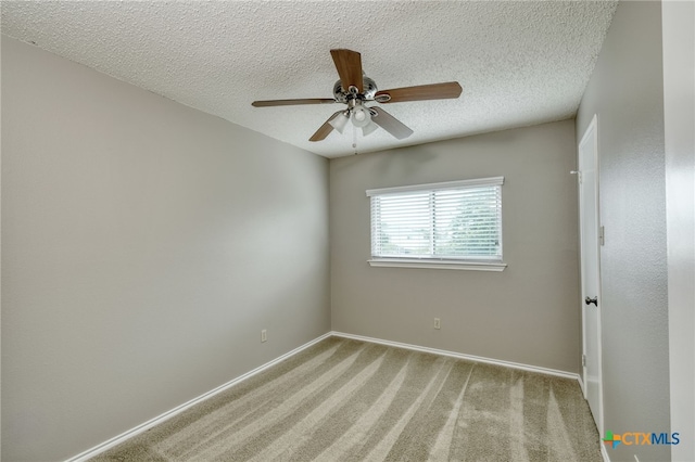 1335 Lakeside Loop, Round Rock, TX 78665 - unfurnished room with a ceiling fan, light colored carpet, and a textured ceiling