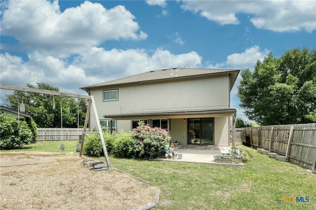1335 Lakeside Loop, Round Rock, TX 78665 - back of property featuring a patio area and a fenced backyard