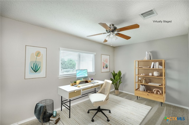 1335 Lakeside Loop, Round Rock, TX 78665 - office area featuring a ceiling fan, carpet, and a textured ceiling