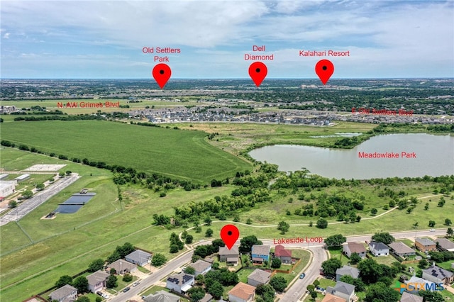 1335 Lakeside Loop, Round Rock, TX 78665 - aerial view of property and surrounding area with a large body of water