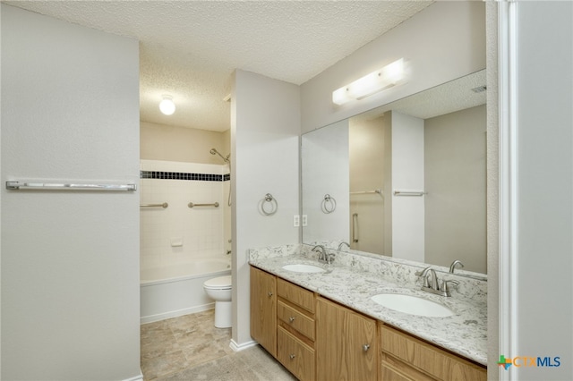 1335 Lakeside Loop, Round Rock, TX 78665 - full bathroom with a textured ceiling, double vanity, and shower / tub combination
