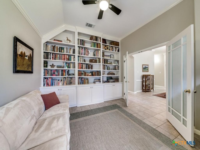 2615 Foresthaven Dr, New Braunfels, TX 78132 - living area with light tile patterned floors, ceiling fan, crown molding, baseboards, and built in features
