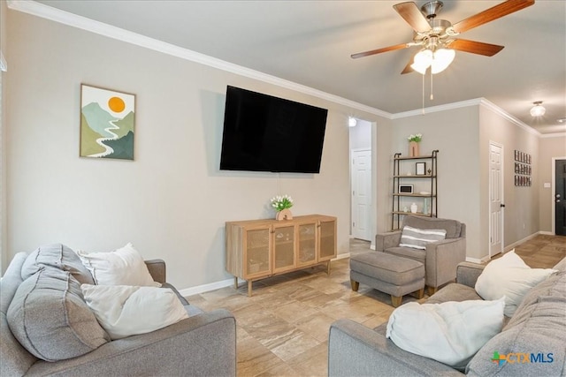 living room featuring ceiling fan and ornamental molding