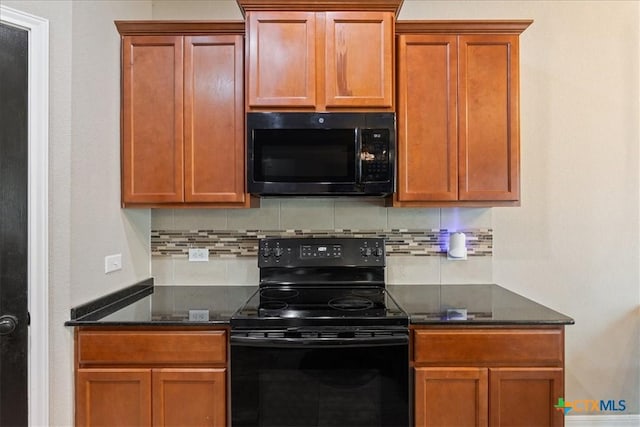 kitchen featuring decorative backsplash and black appliances