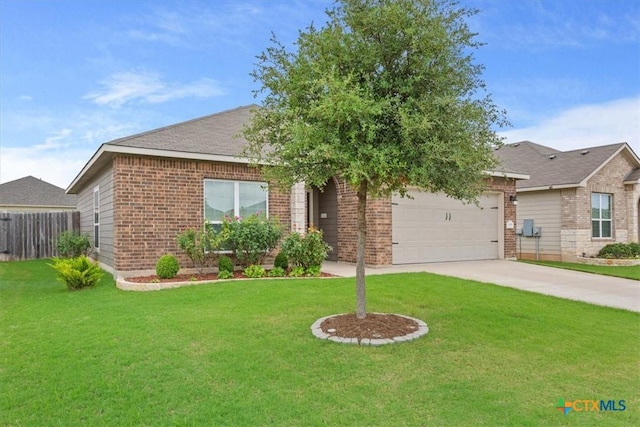 view of front of house with a garage and a front lawn