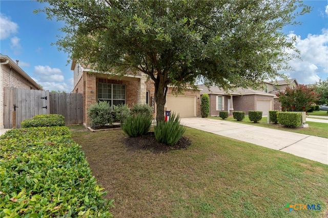 12530 Crockett Way, San Antonio, TX 78253 - obstructed view of property with a garage, driveway, and brick siding