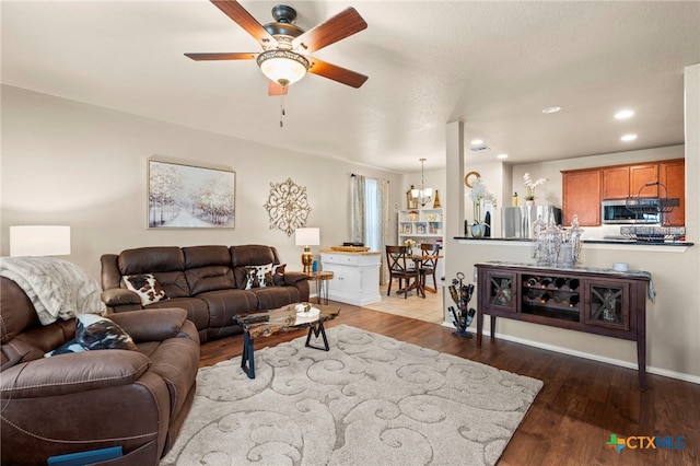 12530 Crockett Way, San Antonio, TX 78253 - living room featuring dark wood-type flooring, a ceiling fan, and recessed lighting