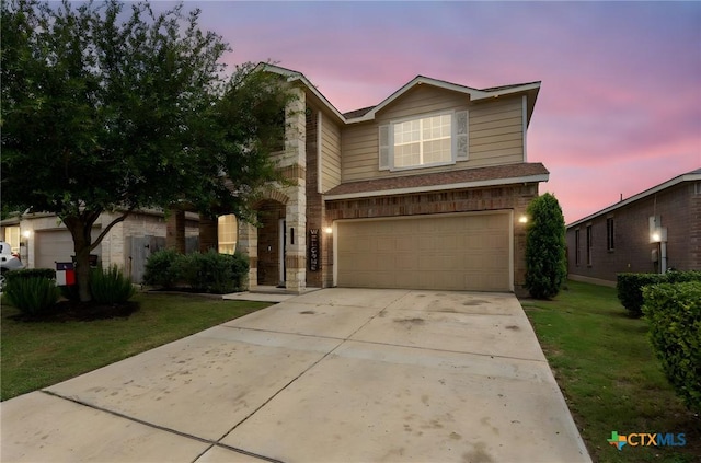 12530 Crockett Way, San Antonio, TX 78253 - traditional-style home with an attached garage, a lawn, concrete driveway, brick siding, and stone siding