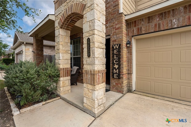 12530 Crockett Way, San Antonio, TX 78253 - entrance to property featuring brick siding, a garage, and a shingled roof