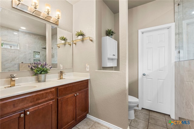12530 Crockett Way, San Antonio, TX 78253 - bathroom with double vanity, tile patterned floors, and a tile shower