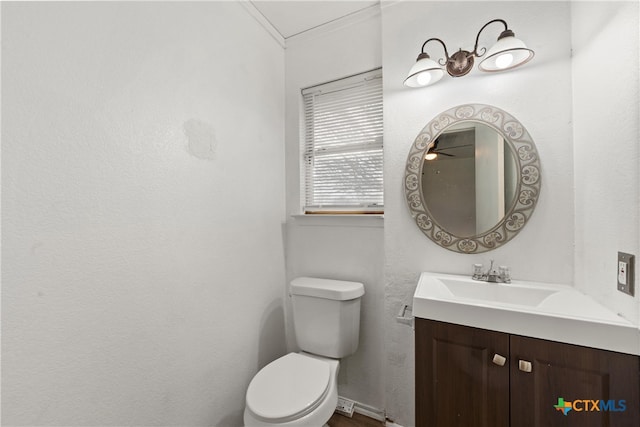 half bath with toilet and vanity