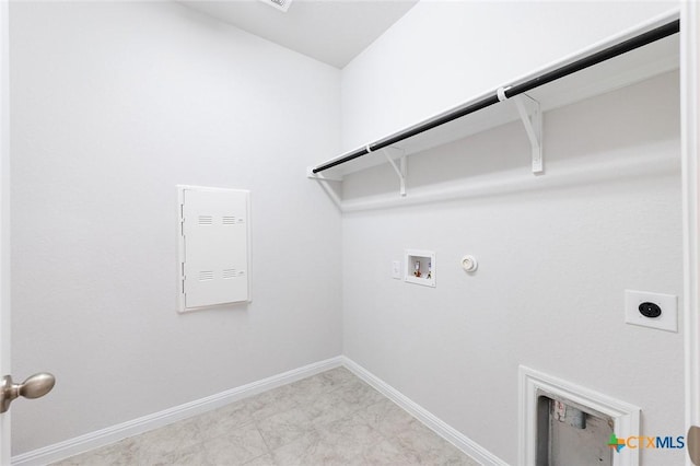 laundry room featuring baseboards, laundry area, electric dryer hookup, washer hookup, and hookup for a gas dryer