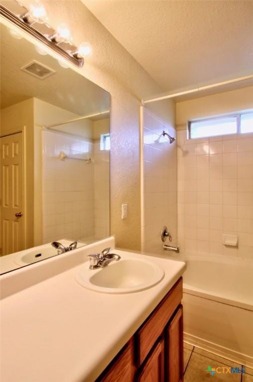 219 Starling Crk, New Braunfels, TX 78130 - bathroom featuring vanity and bathing tub / shower combination