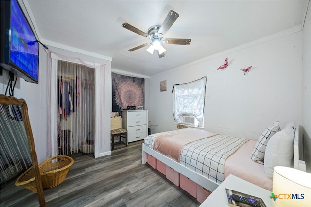 bedroom with ceiling fan, a closet, and wood finished floors