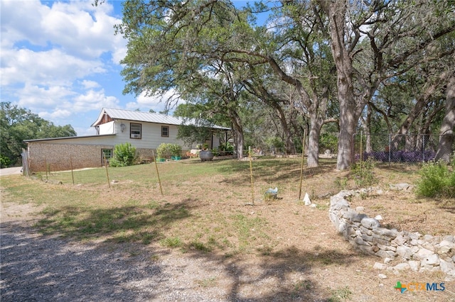 view of yard featuring fence