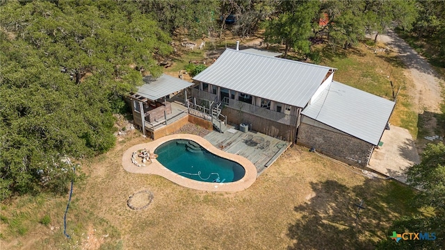 outdoor pool with a deck