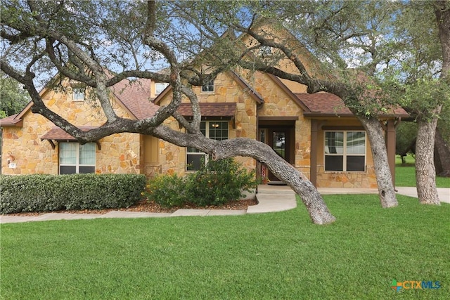 335 Mill Run, New Braunfels, TX 78132 - craftsman house featuring stone siding and a front lawn