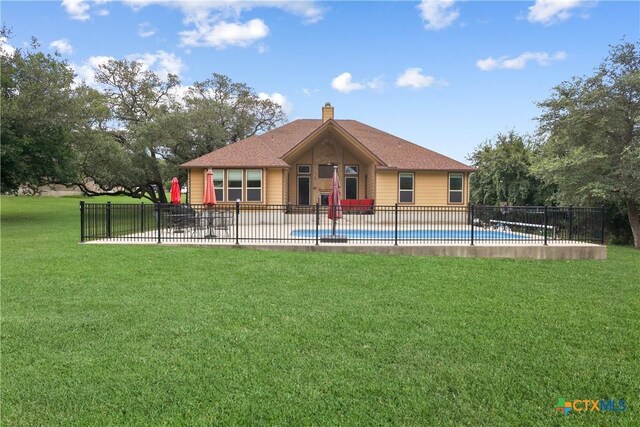 335 Mill Run, New Braunfels, TX 78132 - back of house with a chimney, a patio area, and roof with shingles