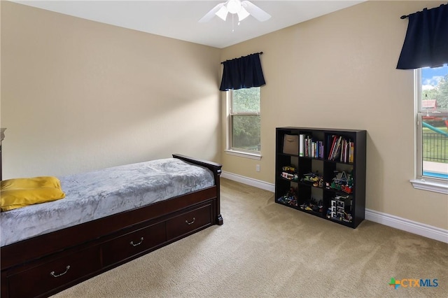 335 Mill Run, New Braunfels, TX 78132 - bedroom with light carpet and a ceiling fan