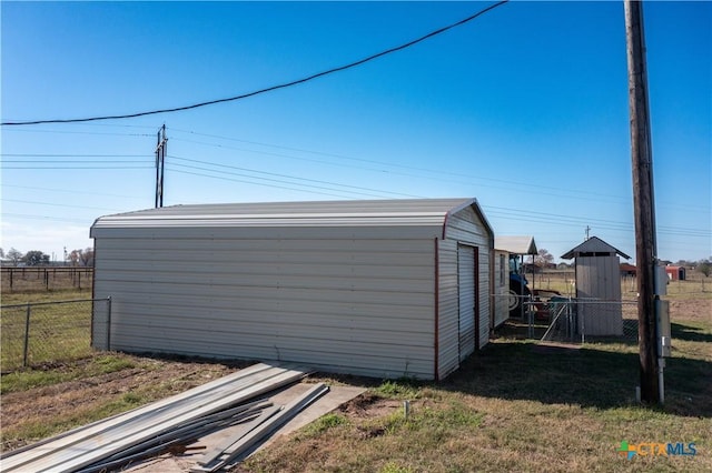 view of outdoor structure with a garage