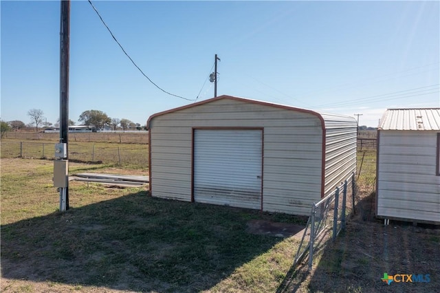 view of outdoor structure featuring a yard