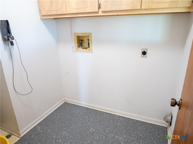 washroom with washer hookup, electric dryer hookup, and cabinets