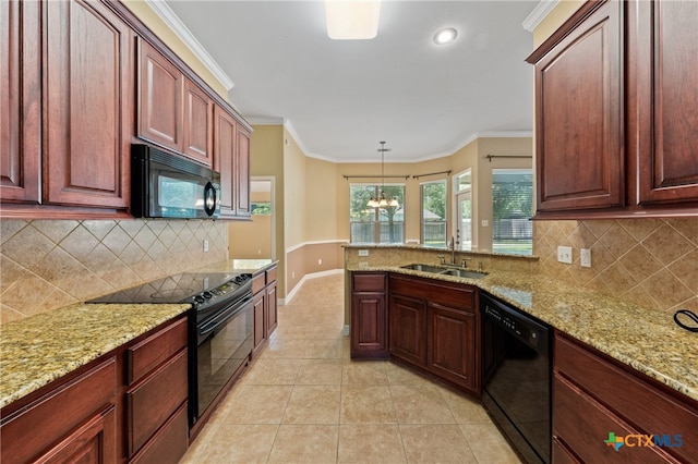 kitchen featuring sink, black appliances, decorative light fixtures, and ornamental molding